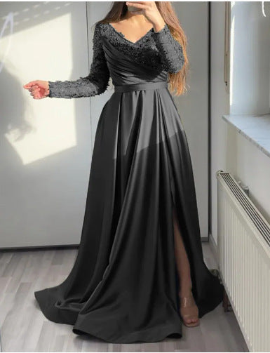 Dame Elegant aftenkjole med skinnende overdel og sideslits Stilla