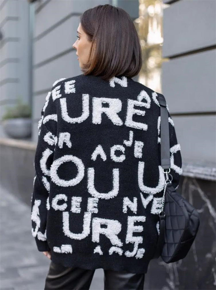 Dame Oversized Strikpullover med iøjnefaldende skrift og afslappet pasform Stilla