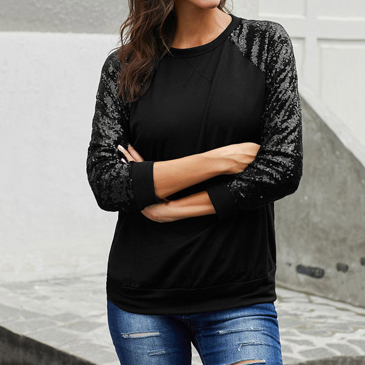 Dame sweatshirt med glitrende palietærmer og moderne snit Stilla
