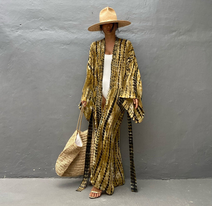 Dame elegant kaftan med legende batikmønster Stilla