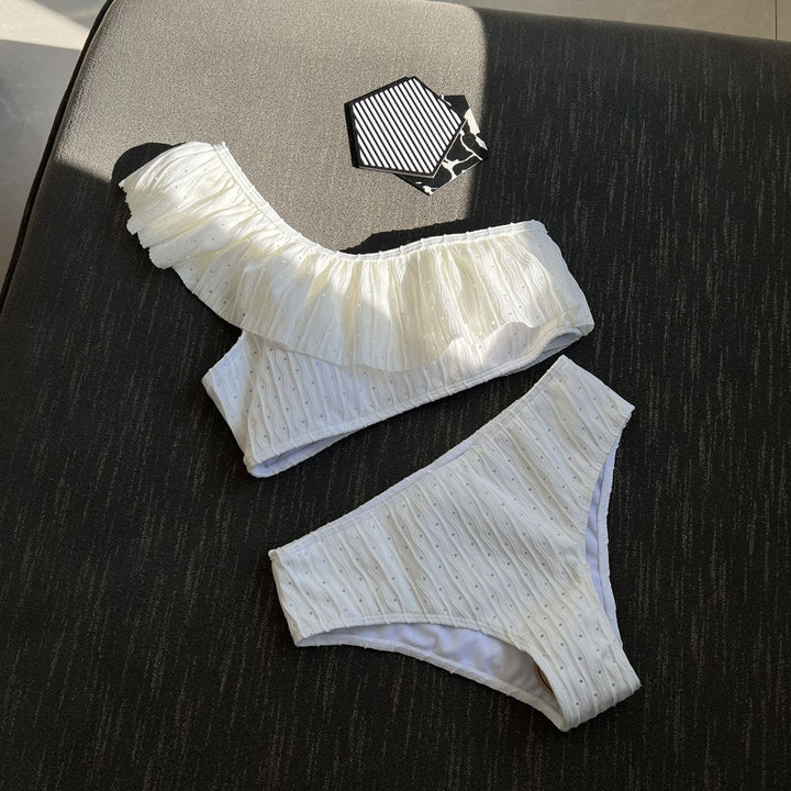 Dame bikini-top med strukturerede flæsedetaljer og høj bærekomfort Stilla