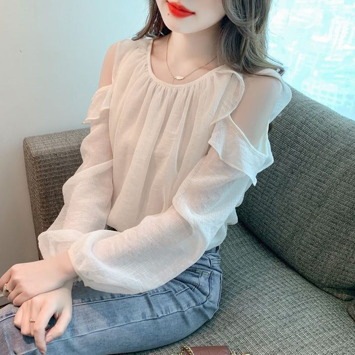 Kvinders bluse med off-shoulder design og flæse detaljer Stilla