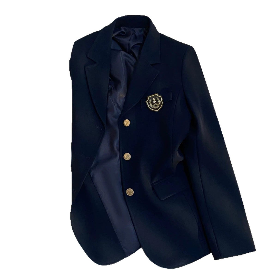 Damernes elegante blazer med gyldne knapper og emblem Stilla