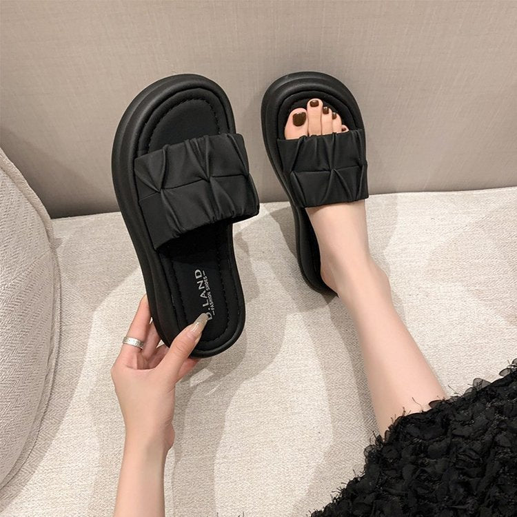 Dame slippers med moderne plisseret design og komfortabel bund Stilla