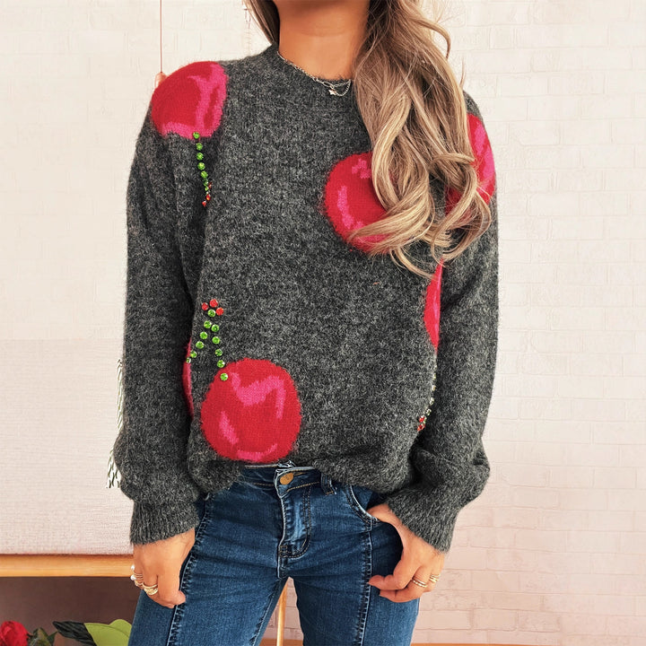 Kvinders hyggelige strikket sweater med blomsterapplikationer og glitrende accenter Stilla