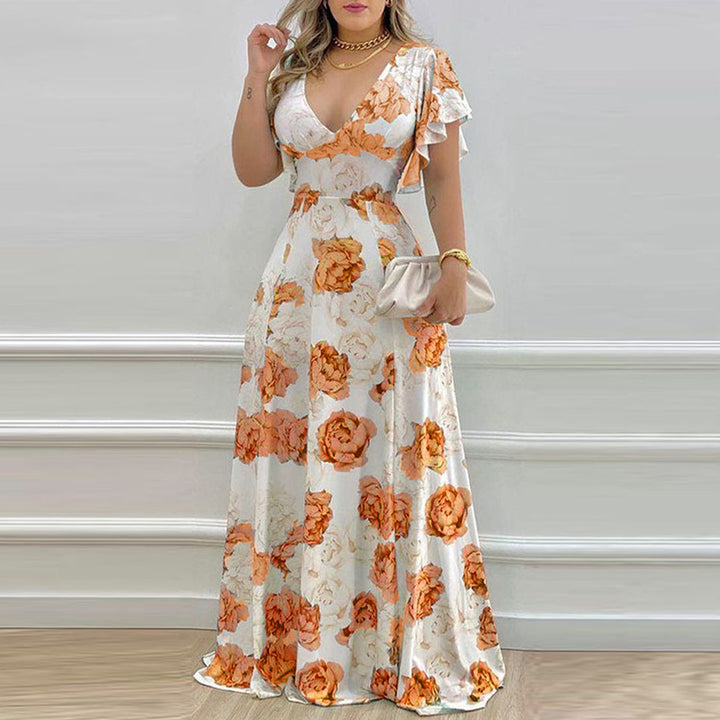 Dame Maxikjole med floralt design og elegante flæsedetaljer Stilla