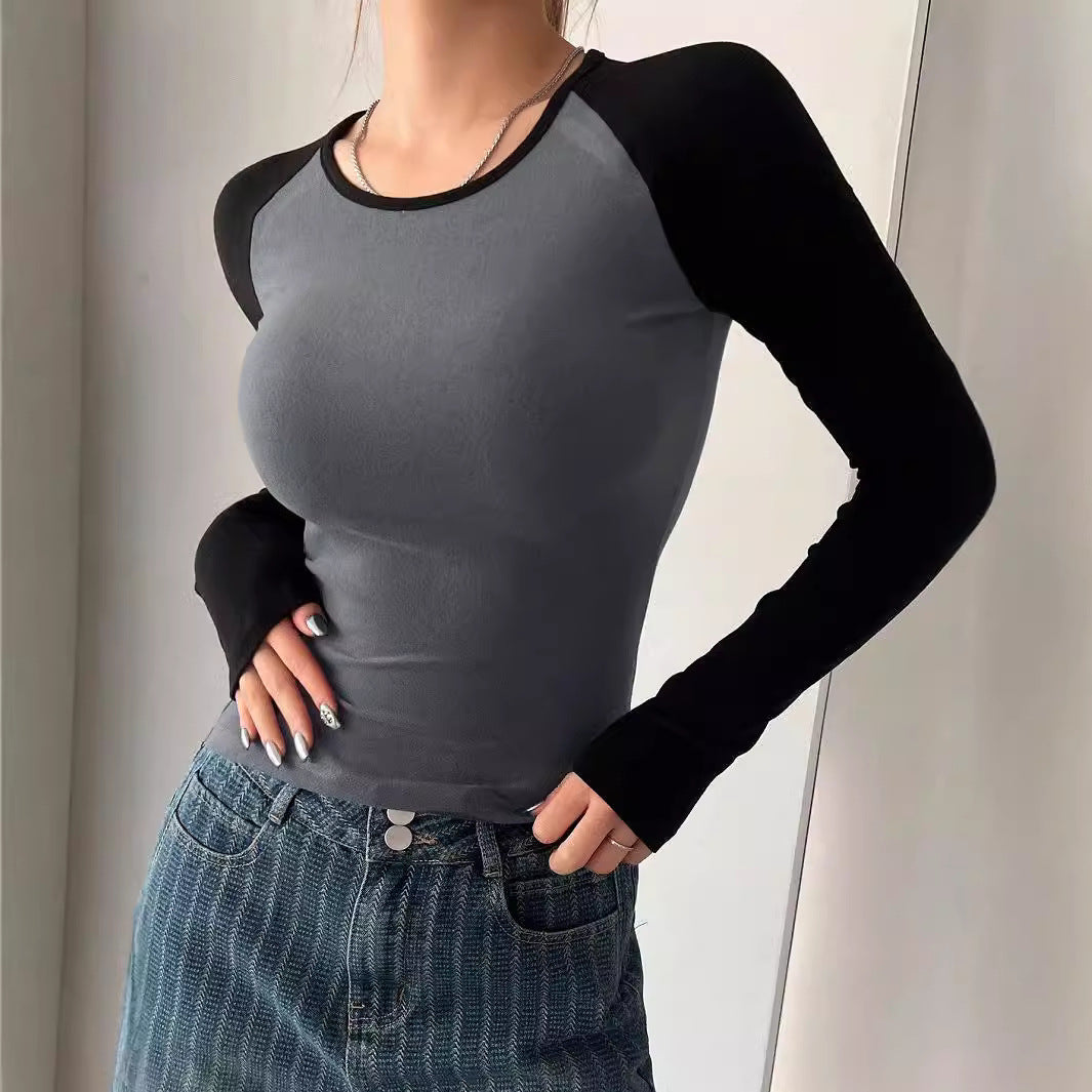 Dame langærmet skjorte i sporty raglan-stil med tætsiddende snit Stilla