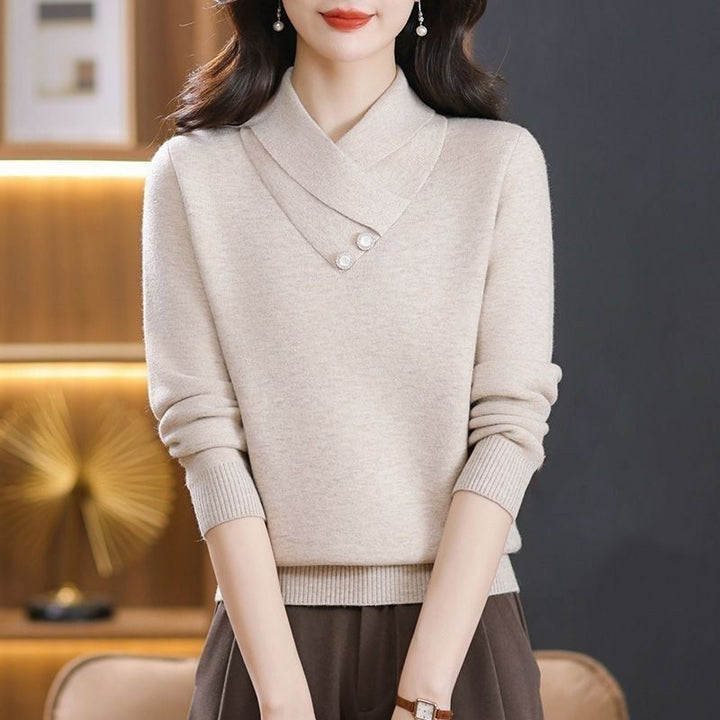 Dames elegant strikket pullover med chic V-hals og dekorative knapdetaljer Stilla