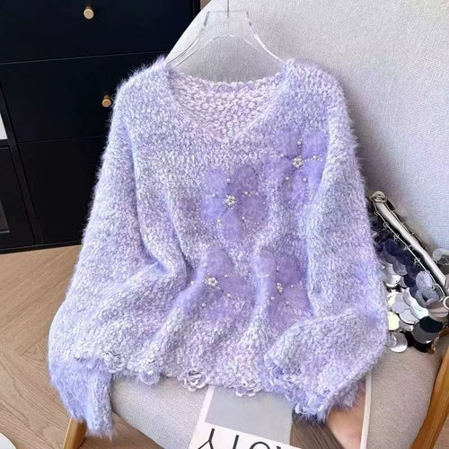 Kvindernes hyggelige sweater med blomsterapplikationer Stilla
