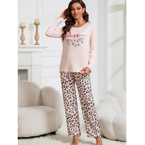 Dame pyjamasæt med langærmet top og leo-mønstret bukser Stilla