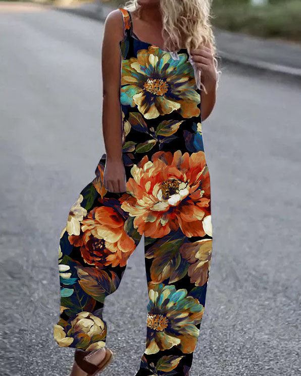Dame luftig jumpsuit med farverigt blomstermønster og justerbare stropper Stilla