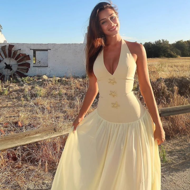 Femme Halterneck Midikjole med knapaccent Stilla