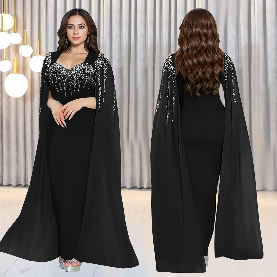 Dame Elegant aftenkjole med ædel kappe og glitrende detaljer Stilla
