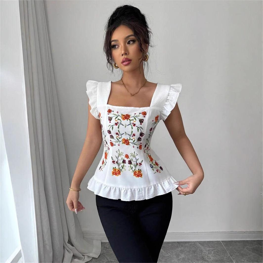 Damebluse med blomster broderier og flæse detaljer Stilla
