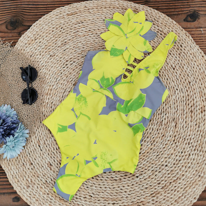 Dame heldragt badedragt med unikt blomstret design og asymmetrisk strop Stilla