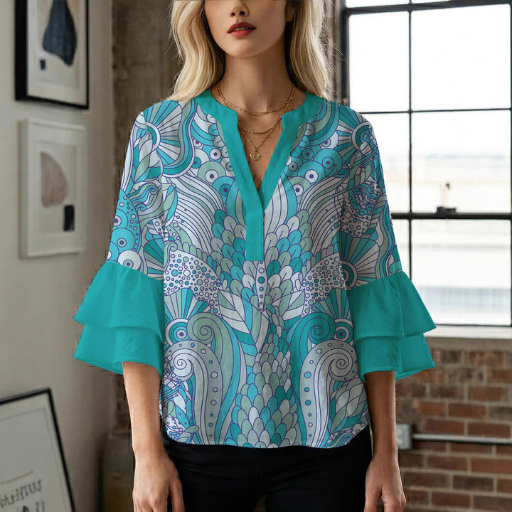 Dame bluse med voluminøse blondererm og kreativt floraldesign Skovae