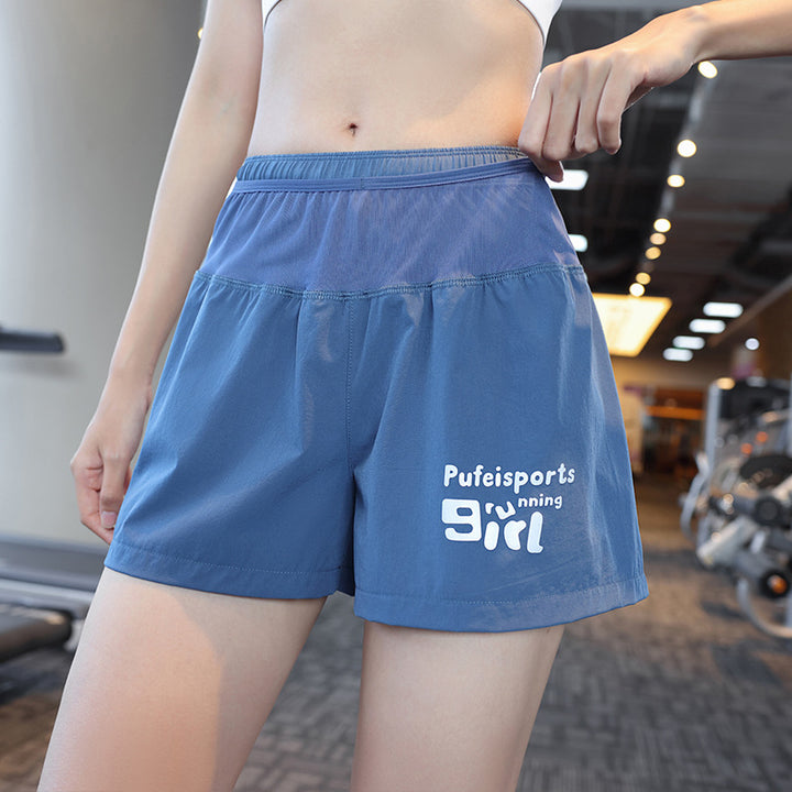 Dame Sporty Løbeshorts med sideventilation og elastisk talje Stilla
