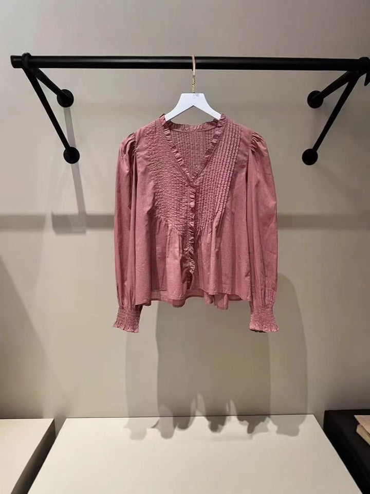 Damebluse med voluminøse ærmer og fine flæsedetaljer Stilla