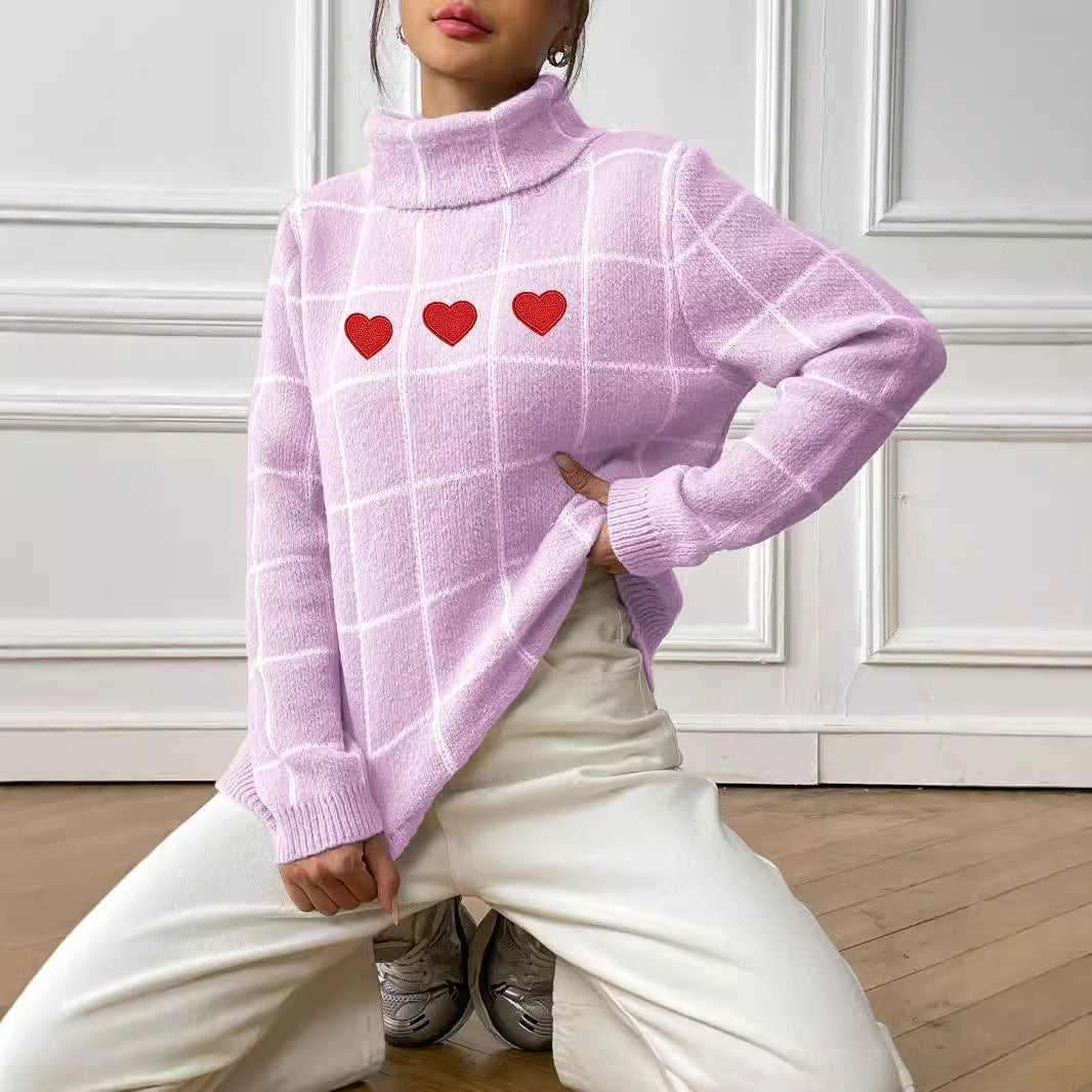 Damer rullekrave sweater med hjerte motiv og ternet design Stilla