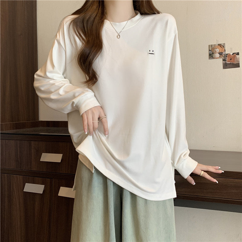 Dame Relaxed Fit Langærmet T-shirt med unikt grafisk detail Stilla