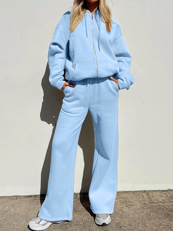 Kvinders afslappet fritidssæt med moderne oversized hoodie og løse bukser