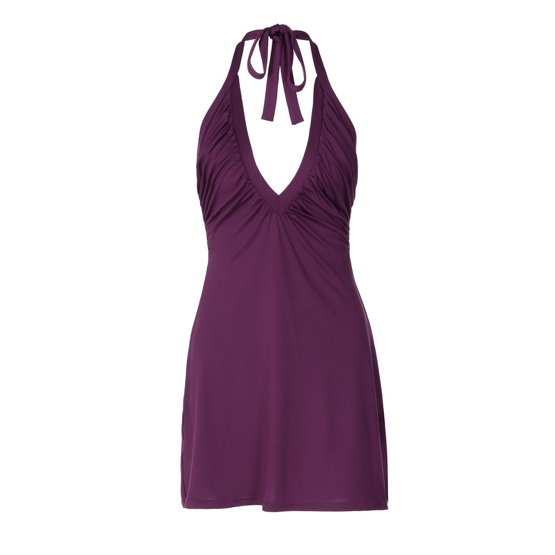 Dame strandkjole med alternativt halter-design og flatterende drapering Skovae