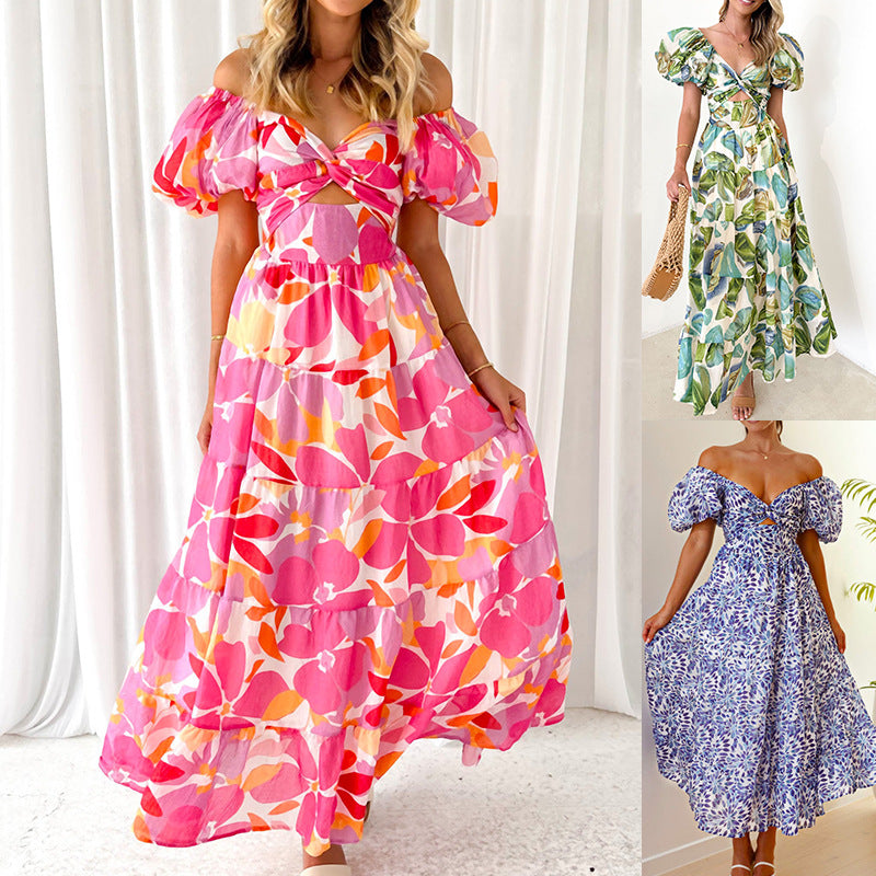Dame maxikjole med voluminøse puffærmer og blomstret design Stilla
