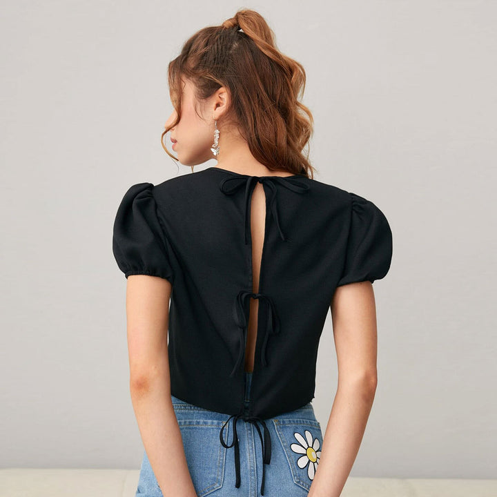 Kvindernes cropped top med puffærmer og blød rund halsudskæring Stilla