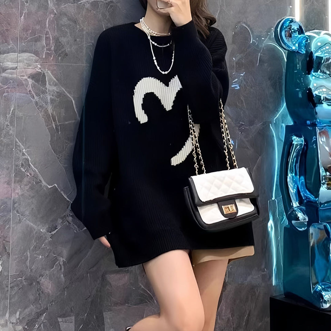 Kvinders oversized sweater med strikket smiley mønster Stilla