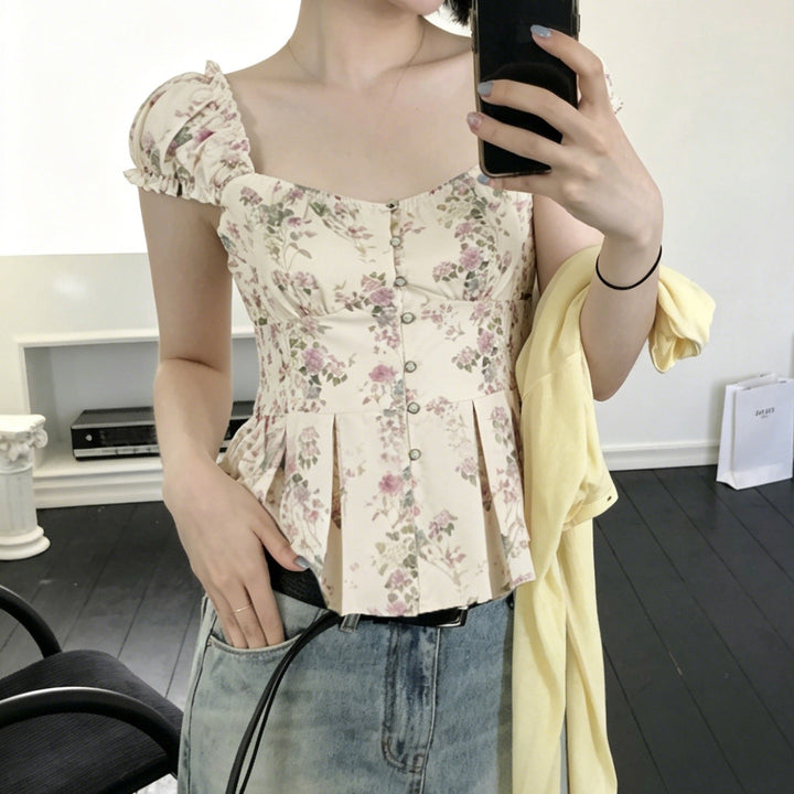 Damebluse med blomsterdesign og flæseærmer Skovae