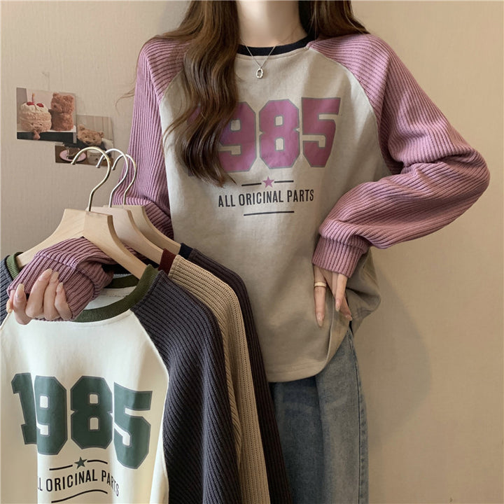 Femme Relaxed Fit Grafik Sweatshirt med kontrast ribærmer Stilla