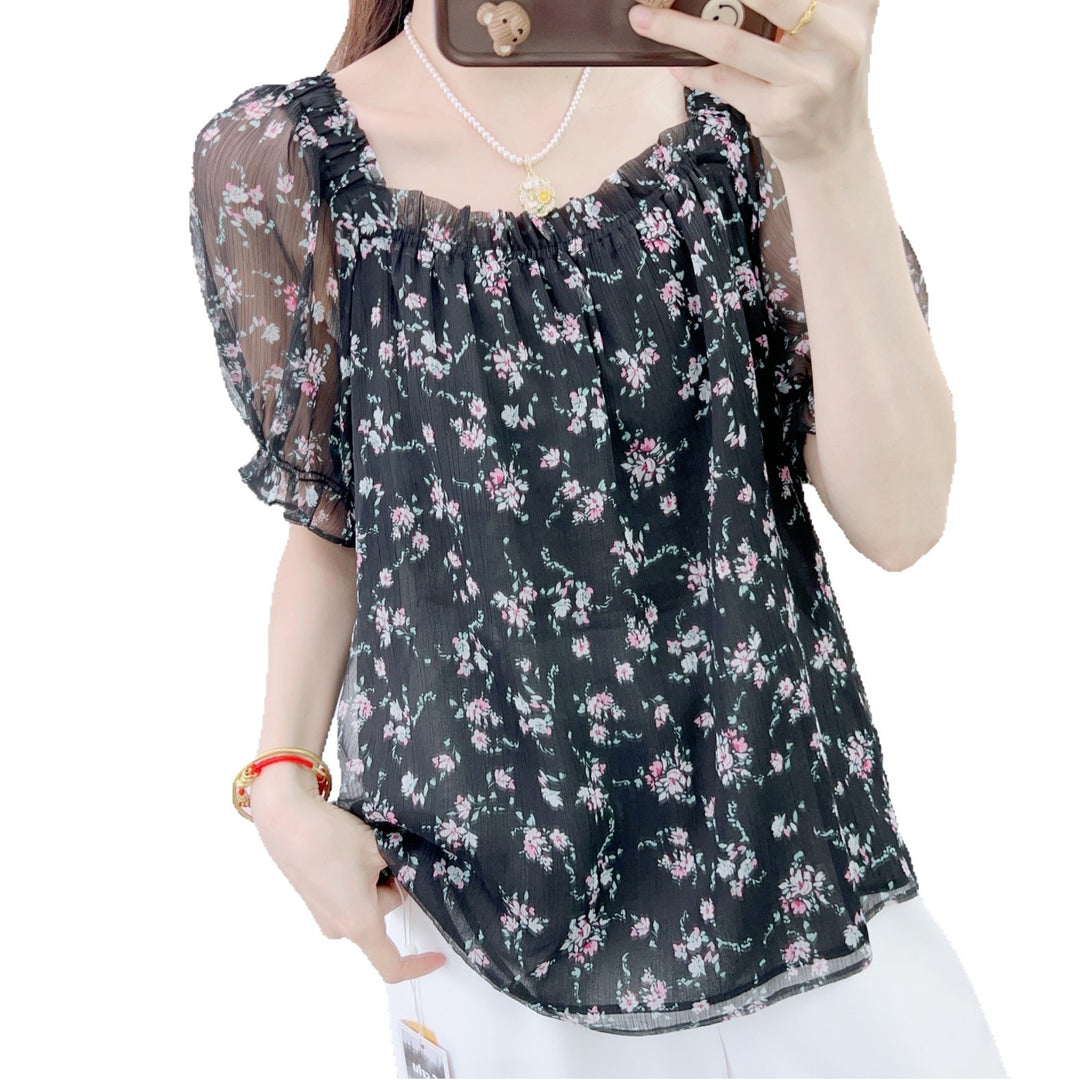 Dame elegant bluse med transparent pufærme og blomsterprint Stilla