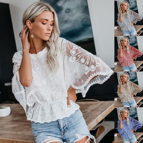 Kvindernes elegante bluse i blonde med voluminøse ærmer Stilla
