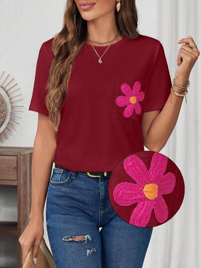 Dame T-shirt med blomstret applikationsmotiv og brystlomme Stilla