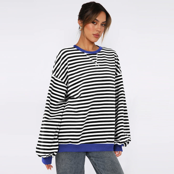 Dame Oversized Sweatshirt med stribet design og komfortable pufærmer Stilla