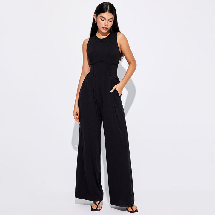Dame jumpsuit med høj talje og praktiske sidelommer Stilla
