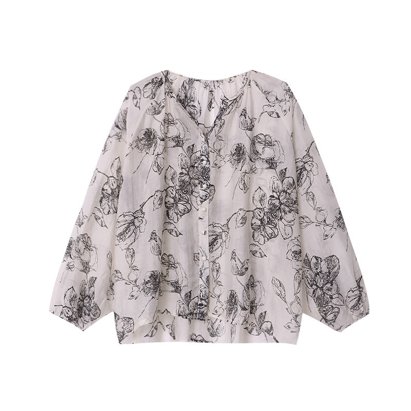 Kvinders bluse med blomstermønster og knapdetaljer Stilla