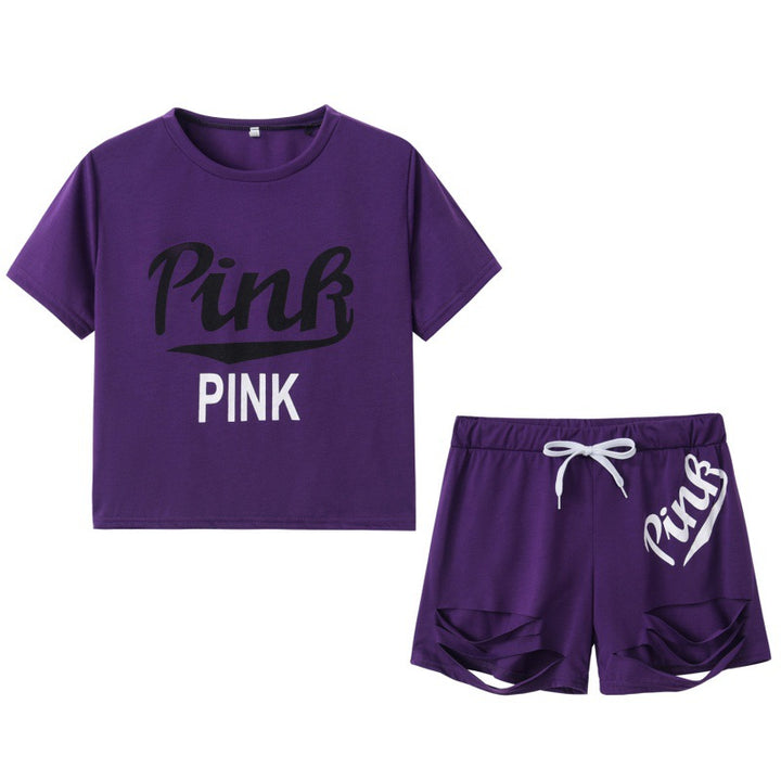 Damer sporty t-shirt og shorts sæt med løs pasform og kontrastprint Stilla