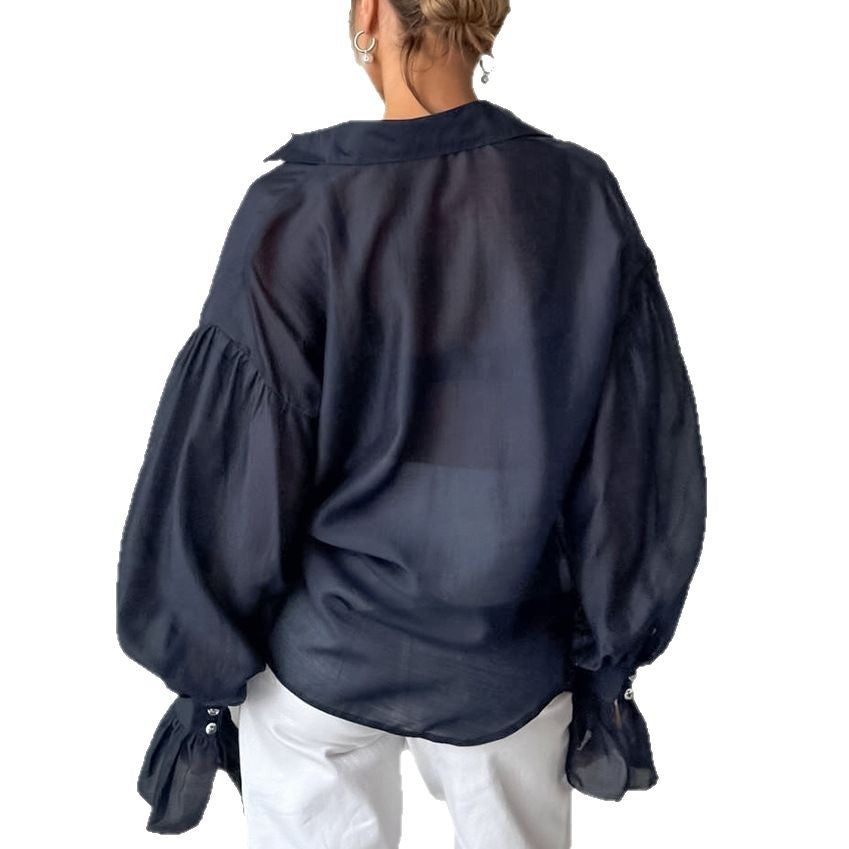 Dame Gennemsigtig Bluse med Puffærmer og Knapdetaljer Stilla