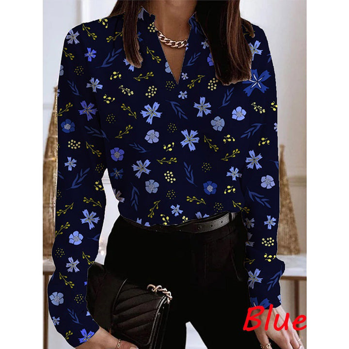 Damebluse med blomstret print og elegant krave Stilla