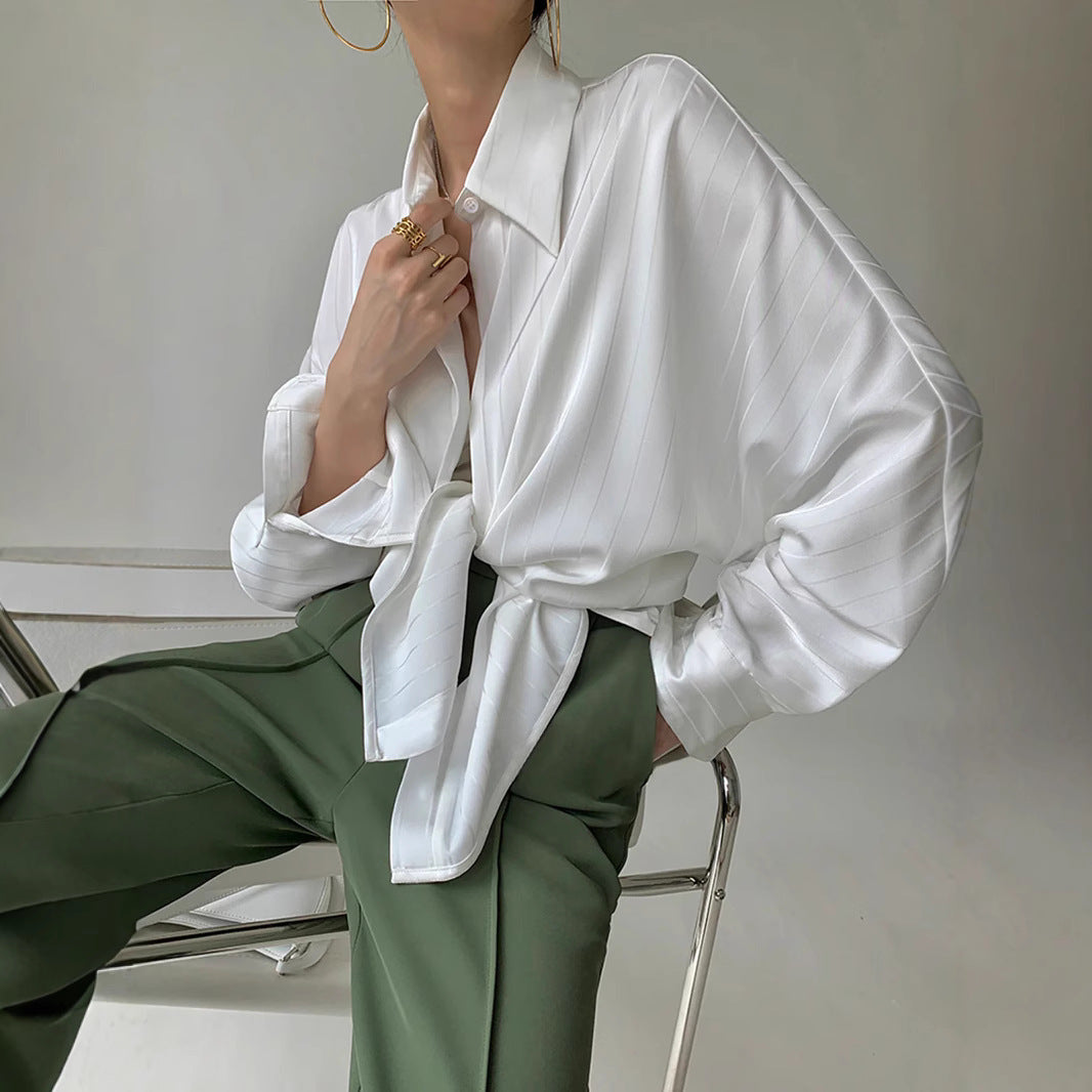 Dame asymmetrisk bluse med elegant taljeudtræk Stilla