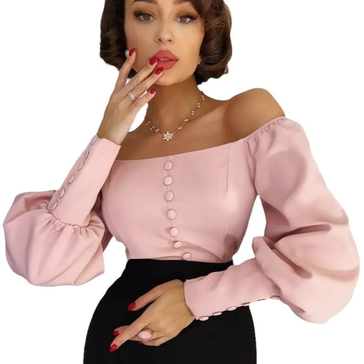 Dame Off-Shoulder Bluse med elegante puffærmer og knapdetaljer Stilla