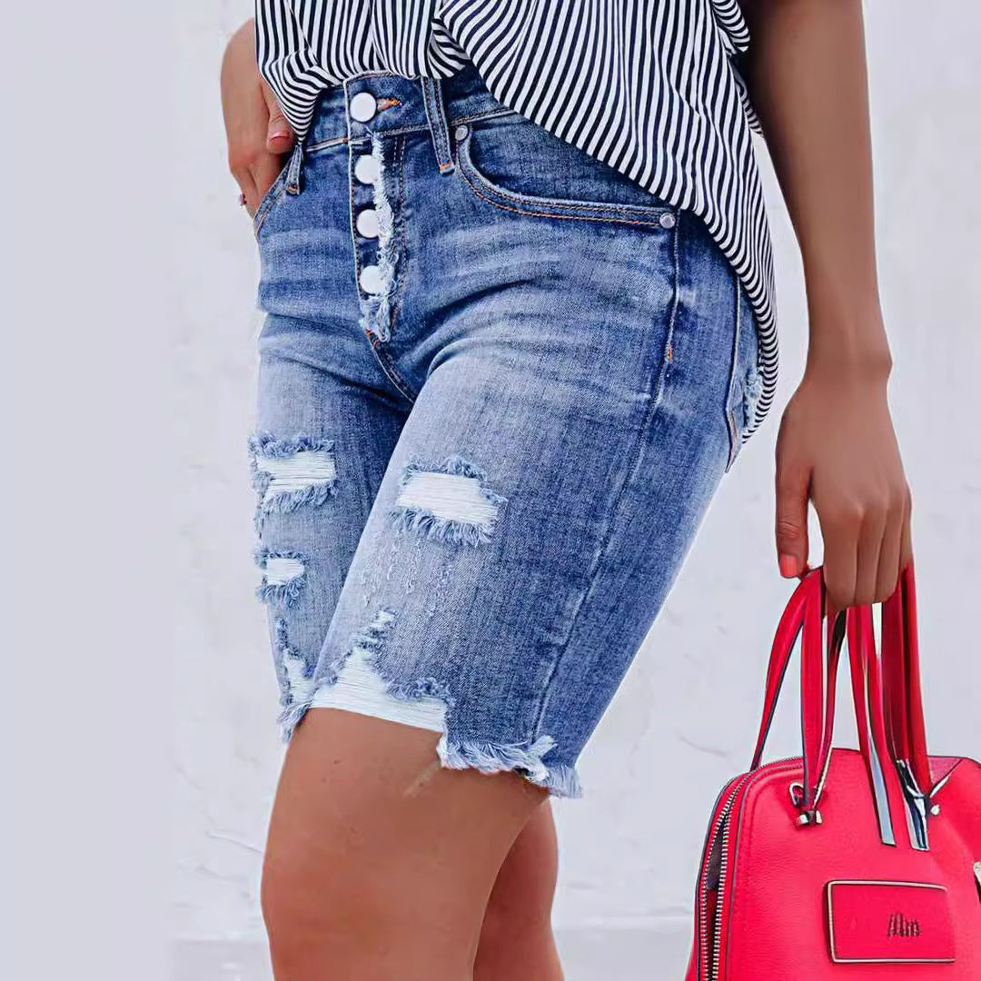 Dame jeansshorts med frynsede afslutninger og moderne destroyed-detaljer Stilla