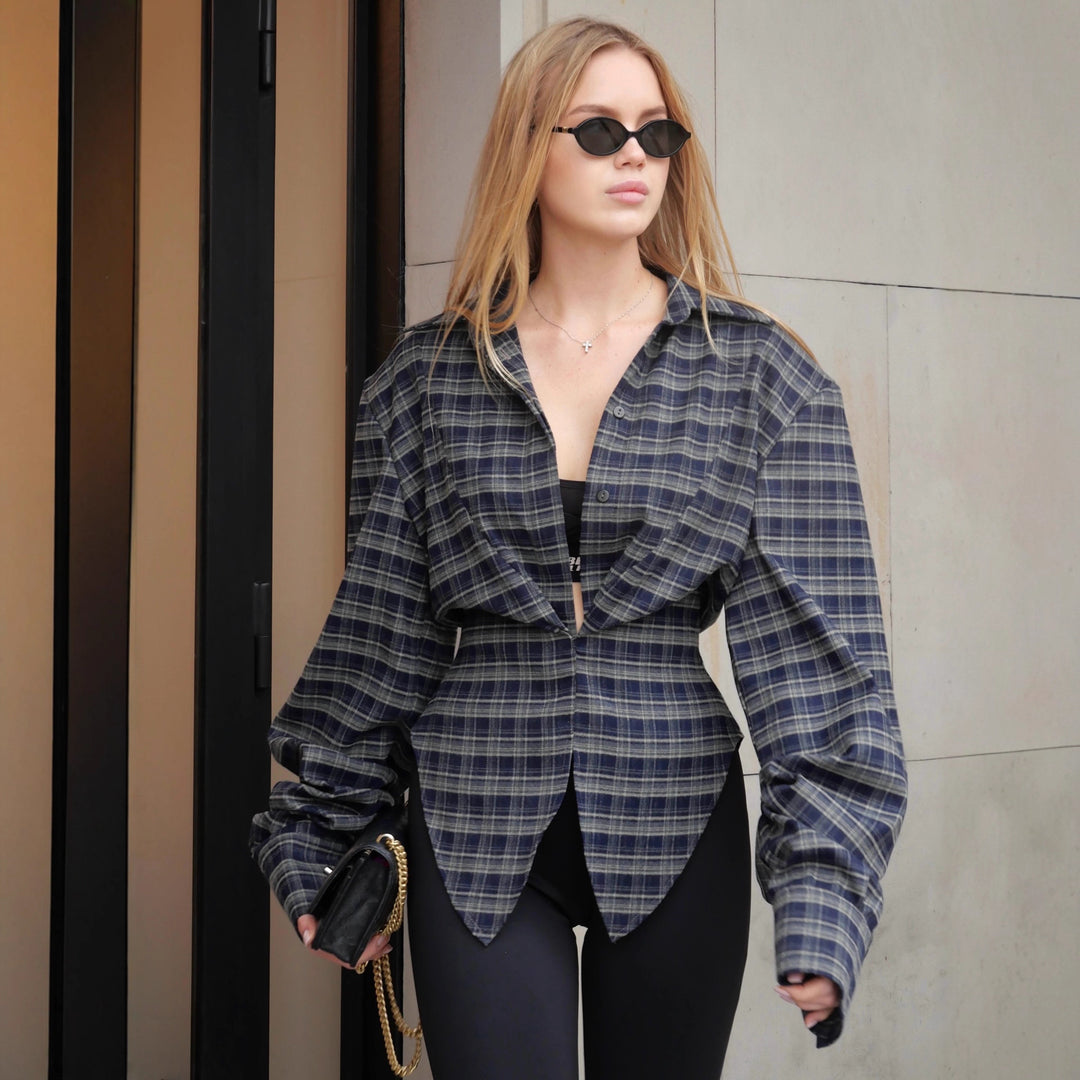 Kvinders oversized skjorte bluse med asymmetrisk kant og oversized ærmer Stilla