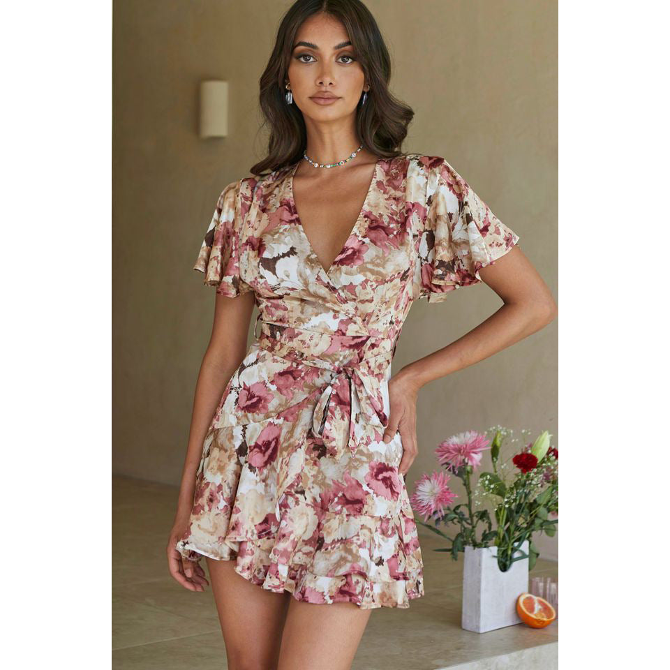 Ladies wrap dress with voluminous sleeves and floral design Skovae