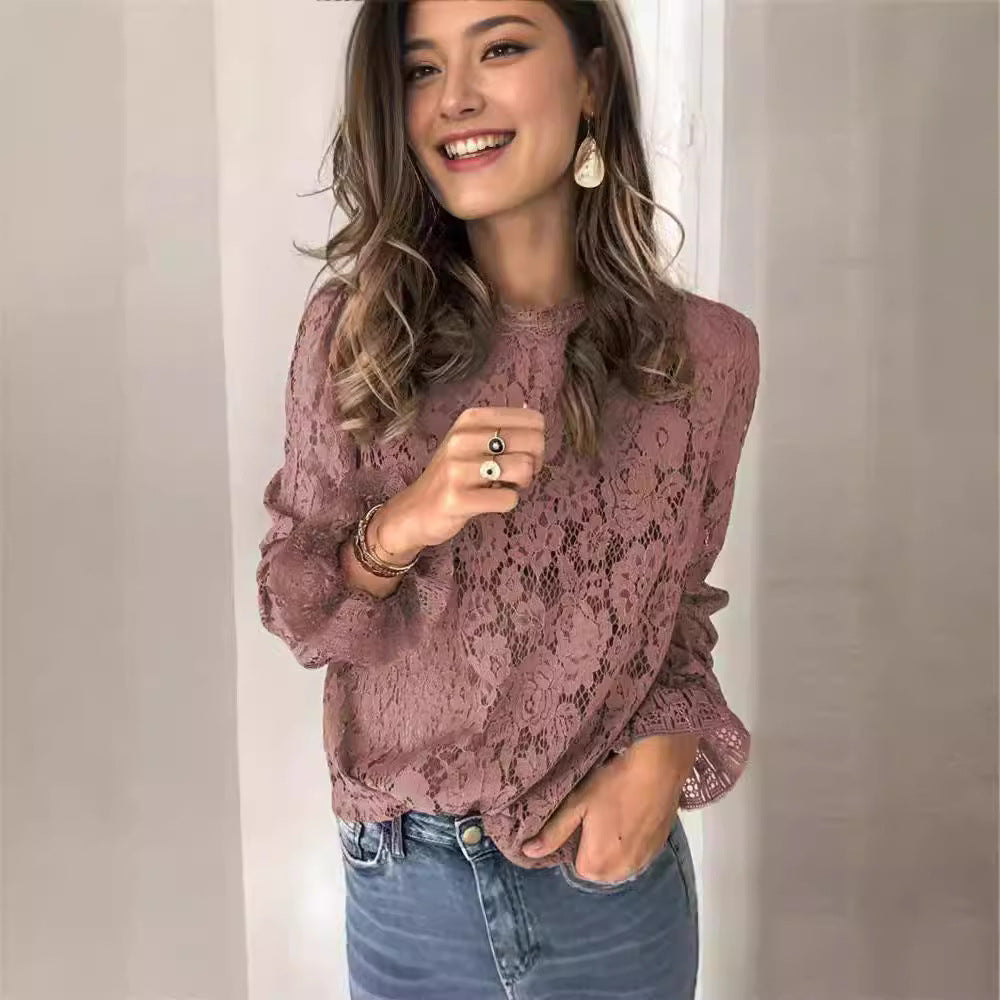 Dame spids top med elegant blomsterdesign og lange ærmer Stilla