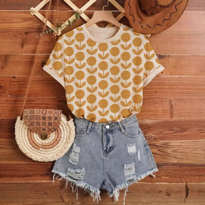 Dame T-shirt med blomstret print i trendy design Stilla