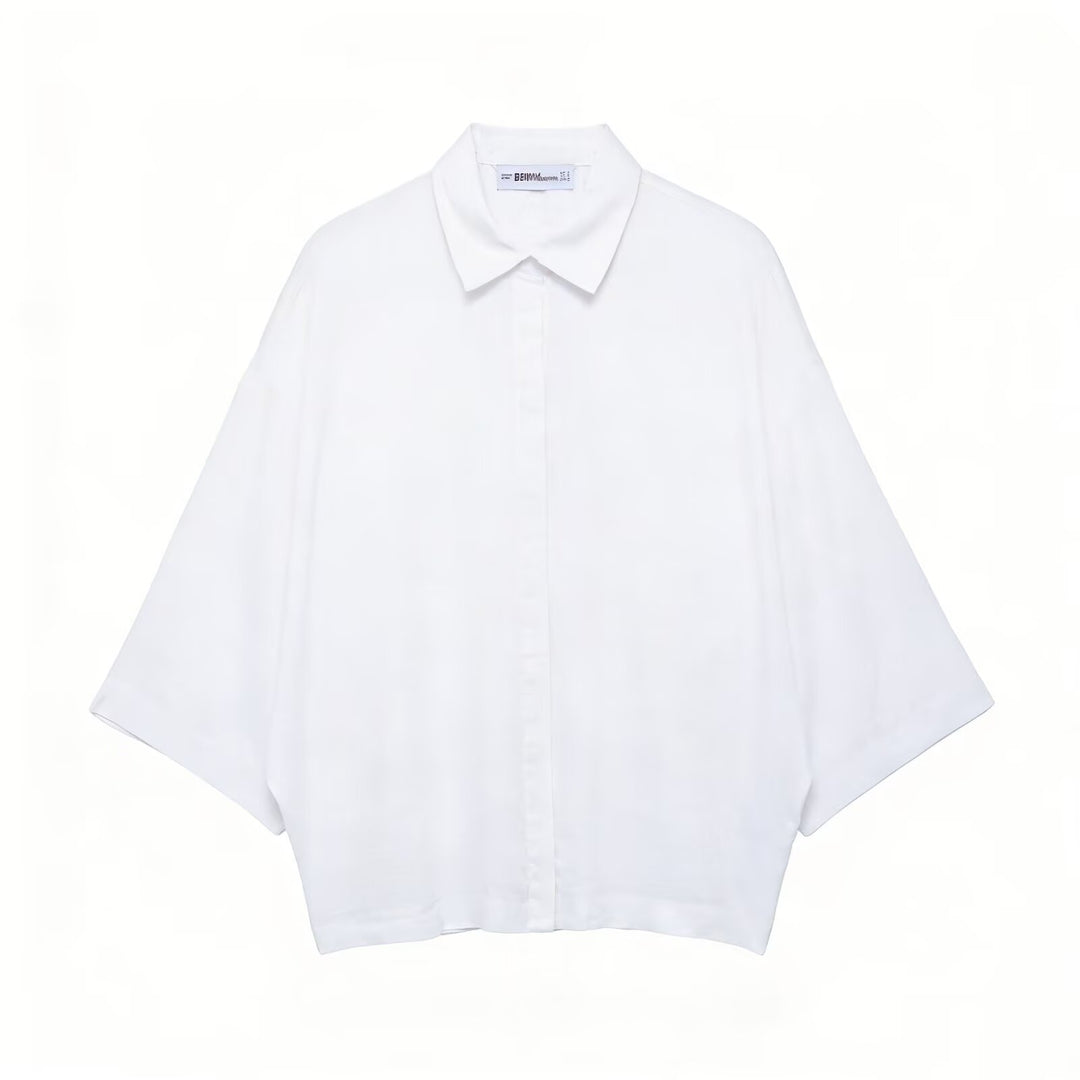 Dame Oversized-bluse med moderne snit og praktiske knapdetaljer Skovae