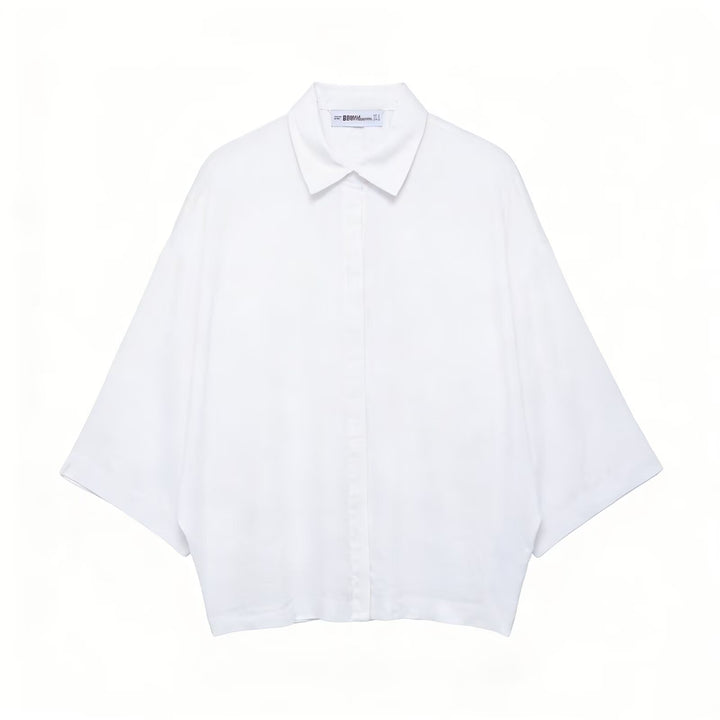 Dame Oversized-bluse med moderne snit og praktiske knapdetaljer Skovae
