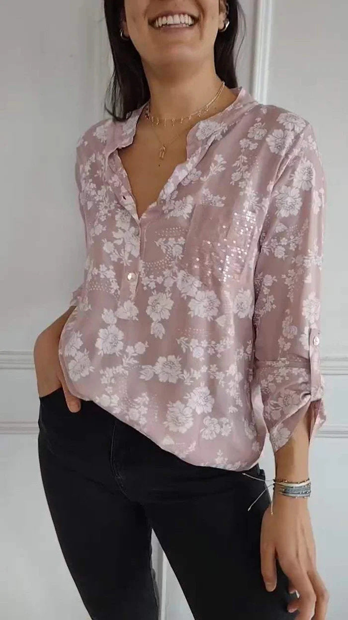 Damebluse med blomstret design og glitrende accenter Stilla
